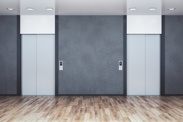 Minimalistic office interior with two elevator.