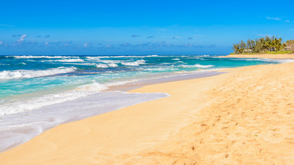 Fototapeta na wymiar Beautiful beach and tropical sea. Sand and water vacation background.