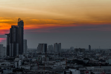 Fototapeta premium Natural blurred background of fog scattered among trees in the morning,with soft sunlight from the sun,seasonal beauty