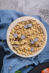 Ripe blueberries and strawberries with yogurt and granola