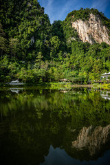 Fototapeta na wymiar Scenic mountains and lake view in Tambun, Perak