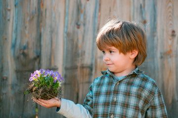 Happy childhood concept. Small boy enjoy childhood years on farm. Eco living.