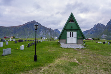 Flakstad cemetery in Lofoten islands in Norway during blue hour. Architecture, religion and traveling conept.