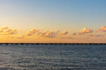 View of a bridge in the island of Cozumel at sunset
