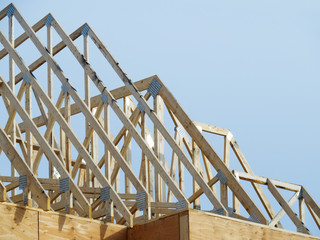 residential house construction roof trusses not yet covered by roofing