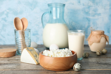 Different dairy products on wooden table