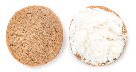 Fresh bun with tasty cream cheese on white background