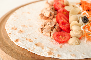 Fototapeta na wymiar Ingredients for tasty doner kebab on board, closeup