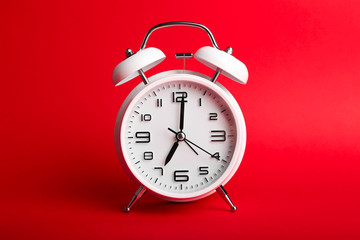 Alarm clock on color background. Time management concept