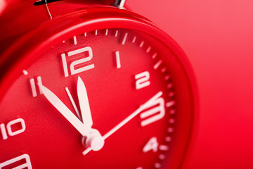 Alarm clock on color background, closeup. Time management concept