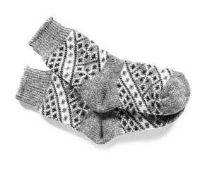 Knitted socks on white background