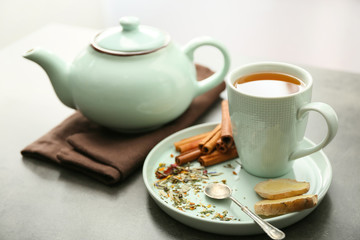 Fototapeta na wymiar Composition with hot tea on table