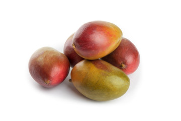 natural looking ripe Palmer mangoes isolated on white