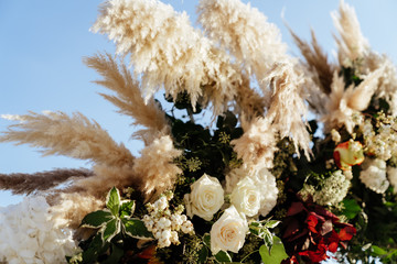 Decorations for the wedding ceremony. Flowers closeup.