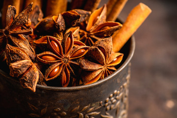 Dried anise stars on the rustic background. Selective focus. Shallow depth of field.