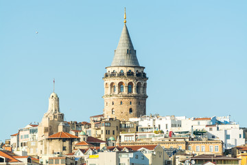 The Galata Tower, called Christea Turris, a medieval stone tower and buildings in the Karakoy quarter of Istanbul, Turkey, to the north of the Golden Horn's junction with the Bosphorus.