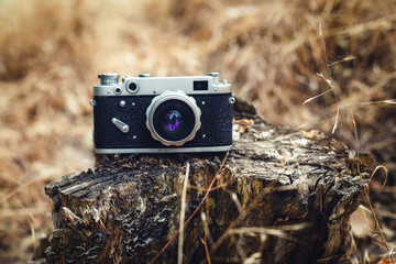 Vintage camera nature background