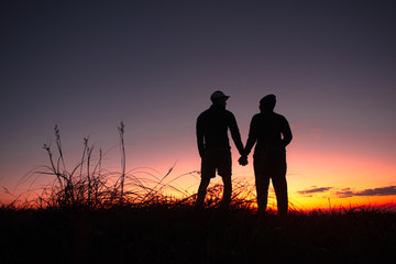 23.10.2019 Friend Group hiking Doi Monjong, Chiang Mai, Thailand., Sunset Silhouette of Young Lovers Hugging in the Mountains., Photos with high shadows and selectable focus