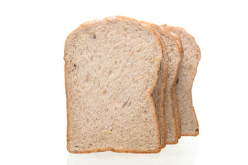 Fresh homemade  baked whole grain bread and sliced bread isolated on white