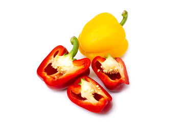 Red and yellow sliced bell peppers Isolated white background