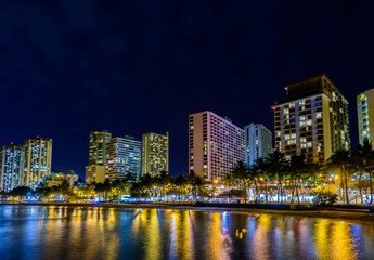 Fantastic view of tropical city at night in Honolulu, Hawaii, USA