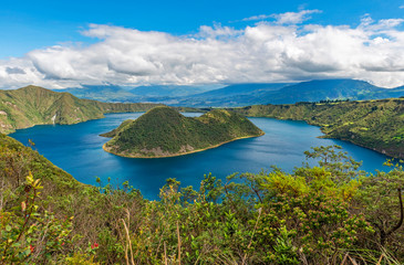 The Cuicocha crater lake or lagoon with the Teodoro Wolf and Yerovi islands along the 5 hour long hike near Otavalo, north of Quito, Ecuador.