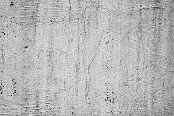Texture of a concrete wall with cracks and scratches which can be used as a background