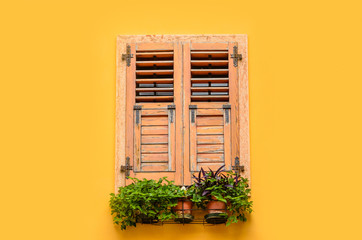 Beautiful window decorated with flowers in italy