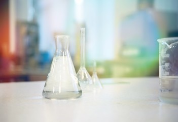 Glassware transparent bottles for lab procedures. bottles and flasks essentia oils for products-treatment medical test