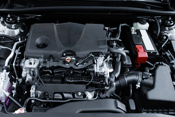 Looking under the hood of an internal combustion automobile engine