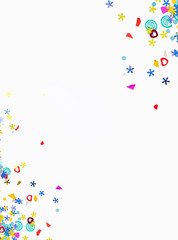 Frame of colorful confetti on white background top view