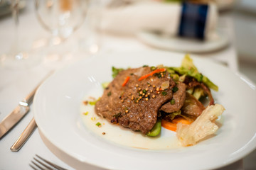 Salad with meat and greens.