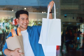 portrait of a man with shopping bags