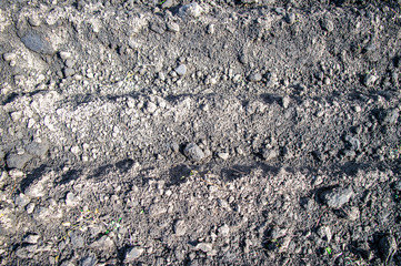 Black soil texture background closeup