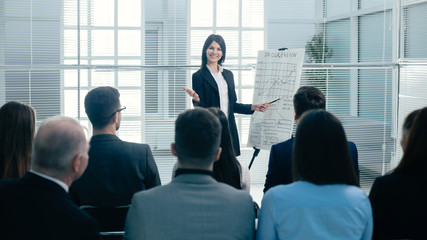 businesswoman making a presentation for the employees of the company
