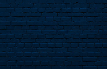 blue brick wall with layer of paint