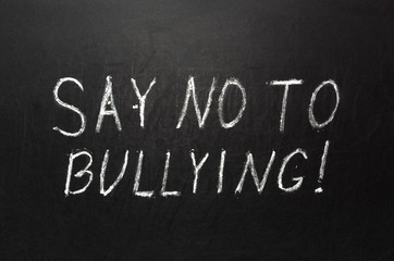 Chalkboard with a concept of say no to bullying of blackboard

