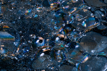 Soap bubbles in water abstract