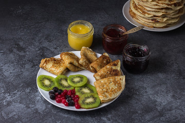 Homemade pancakes - a traditional dish of Russian cuisine, a treat on Maslenitsa