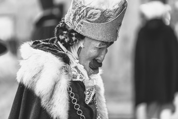 Ancient carnival of Sauris. Traditional wooden masks. Black and white. Italy