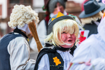 Ancient carnival of Sauris. Traditional wooden masks. Italy