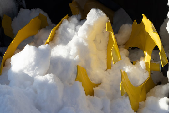 Wheel snow blower stands in a snowdrift