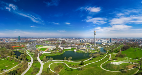 A wonderful spring day in Munich Olympiapark from above as a drone shot. - obrazy, fototapety, plakaty