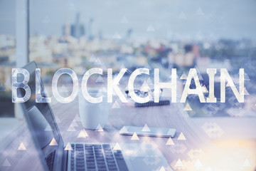 Double exposure of blockchain theme hologram and table with computer background. Concept of bitcoin...