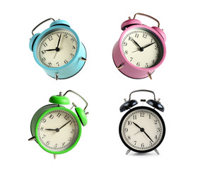 Multicolored alarm clocks set isolated on white background.