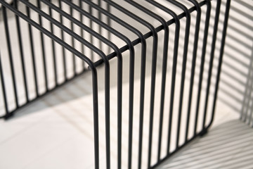 Closeup view at dark metal lattice stand