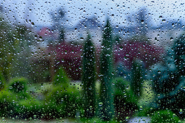 Raindrops on window. Stormy weather.
