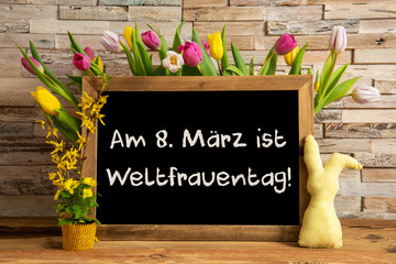 Blackboard With German Text Weltfrauentag Means International Womens Day. Colorful Tulip Spring...