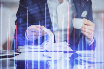 Double exposure of businessman with coffee with stock market forex chart.
