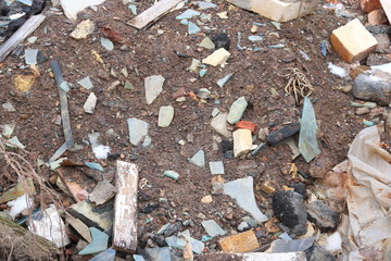 Construction waste with elements of various dismantled and destroyed old structures at municipal landfill
